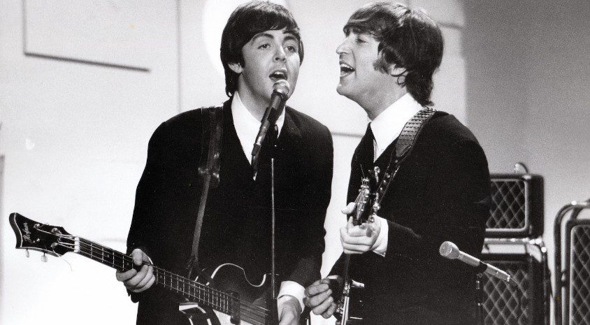 I Beatles venivano spesso ritratti con amplificatori Vox: qui Paul e John si esibiscono in "Toast of the Town" della CBS nel 1965. Immagine: Universal Music Group / The Beatles On Air - Live at the BBC Volume 2 Pressefoto